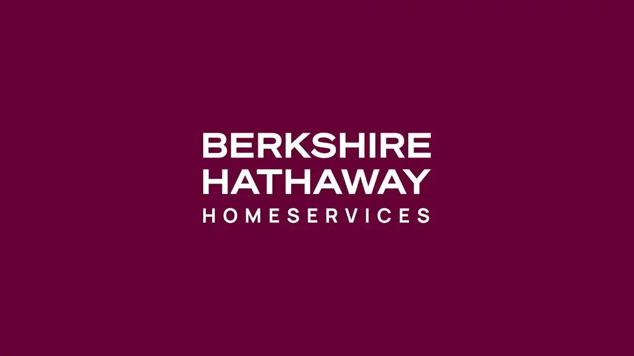 Berkshire Hathaway HomeServices logo in white on a burgundy background