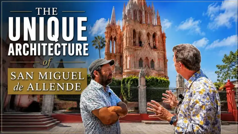 Two men in patterned shirts discuss in front of San Miguel de Allende's pink Gothic cathedral; thumbnail text reads 'The Unique Architecture of San Miguel de Allende'