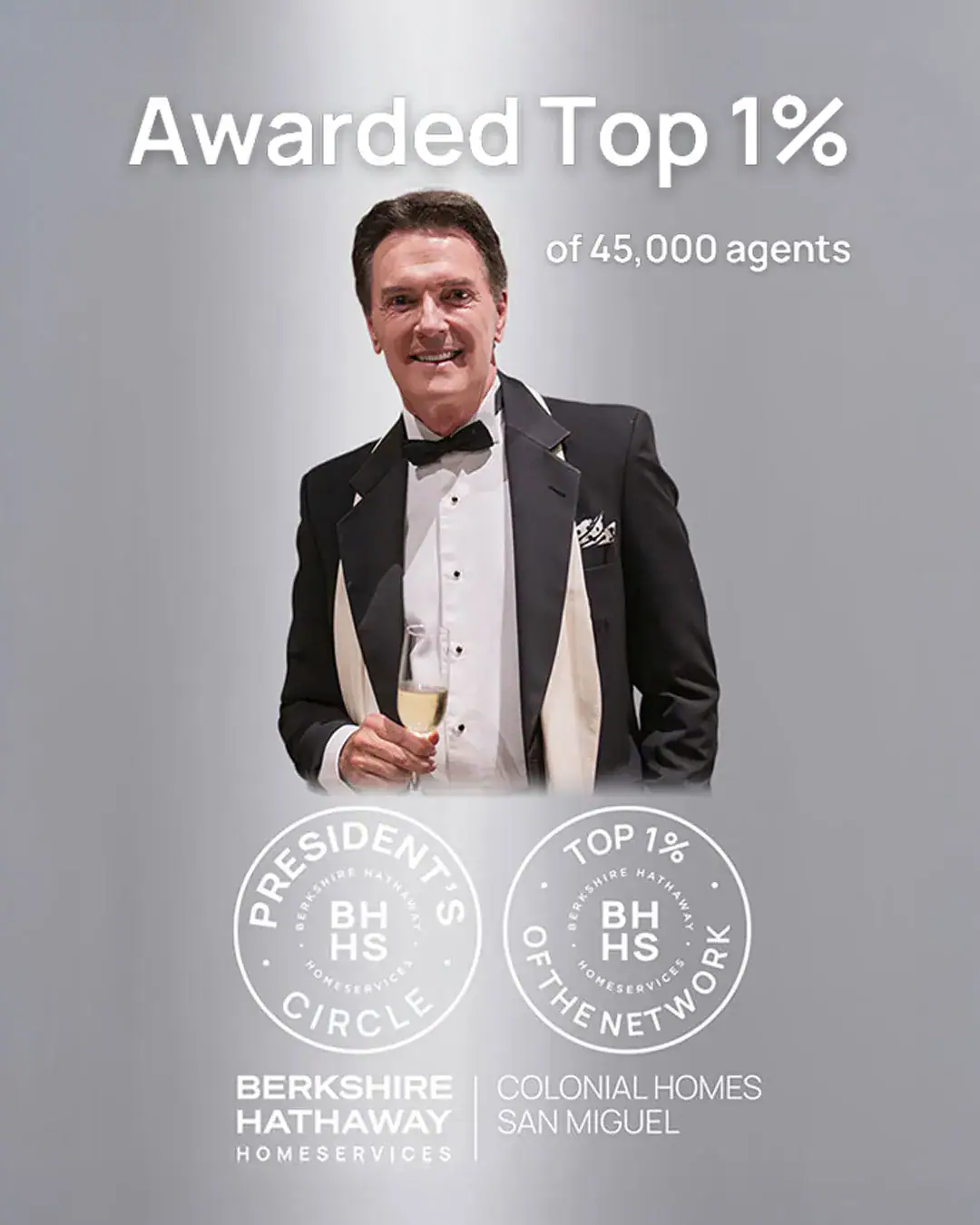 Man in a black-tie suit holding a champagne glass, celebrating being in the Top 1% of 45,000 agents; Berkshire Hathaway HomeServices logos shown below.