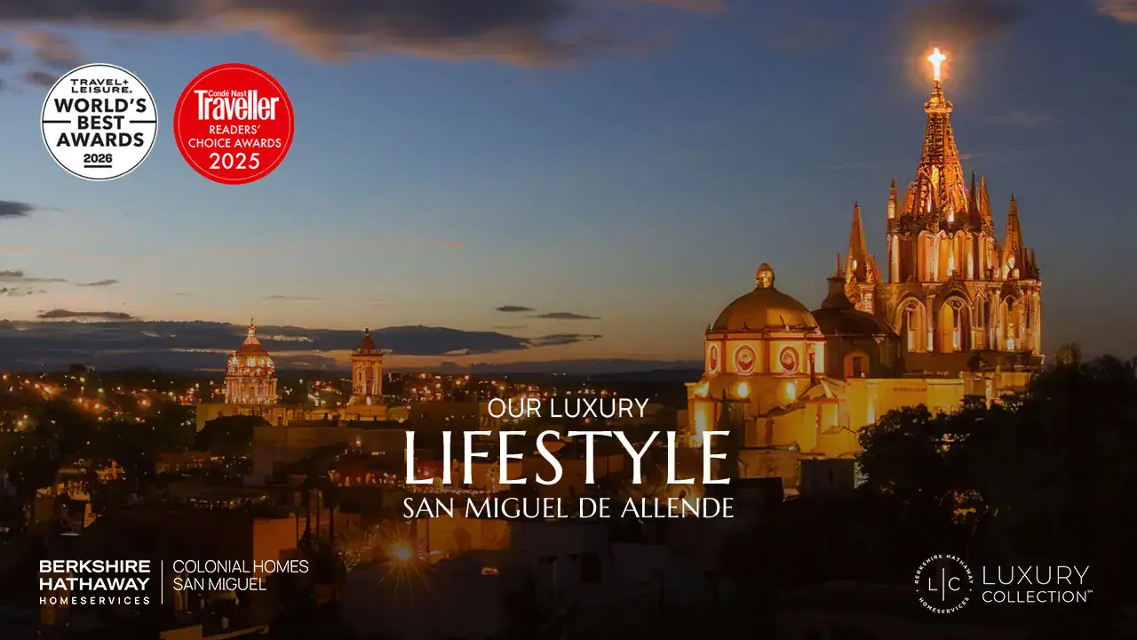 Dusk cityscape of San Miguel de Allende with illuminated church domes, promoting a luxury lifestyle banner