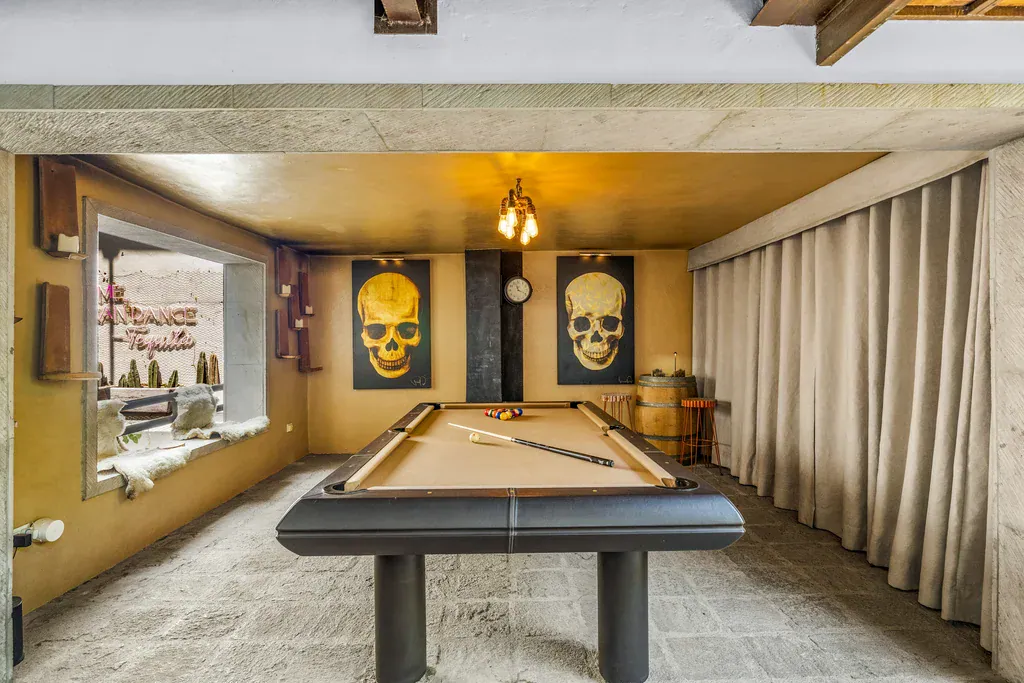 Casa Clae, game room with a pool table and skull artwork, San Miguel de Allende