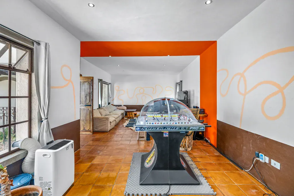 Casa Clae, family room with an air hockey table, San Miguel de Allende