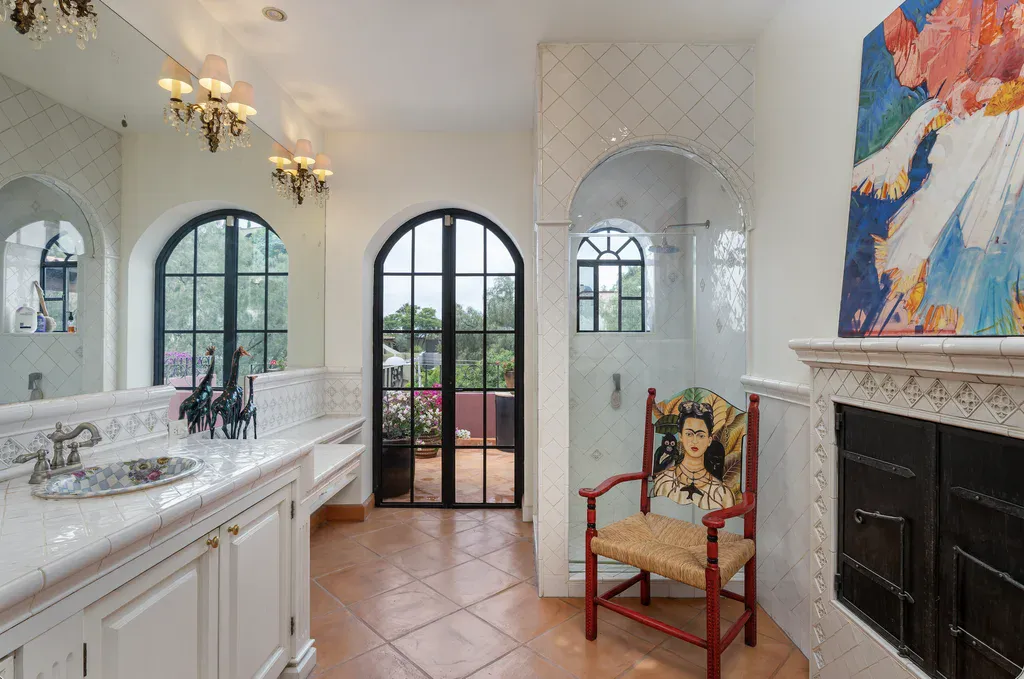 Casa del Arroyo, bathroom with a tiled double vanity, a shower and an arched door, San Miguel de Allende