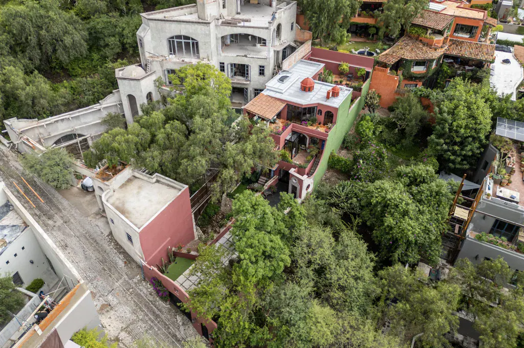 Casa del Arroyo, angled aerial view of the property on the hillside, San Miguel de Allende