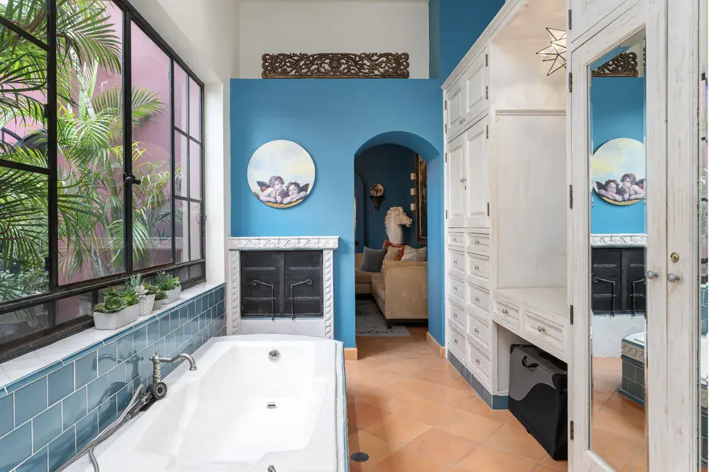 Casa del Arroyo, bathroom with blue tile, a soaking tub and a garden window, San Miguel de Allende