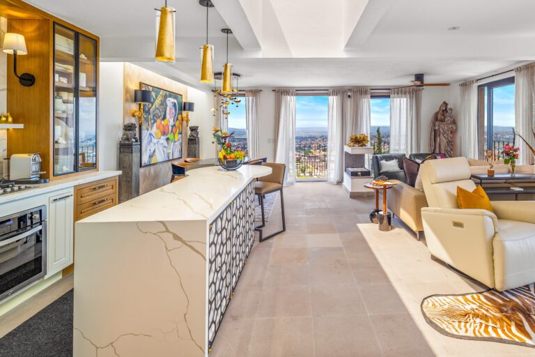 Casa Romana, open kitchen and living area with a marble waterfall counter and city views, San Miguel de Allende