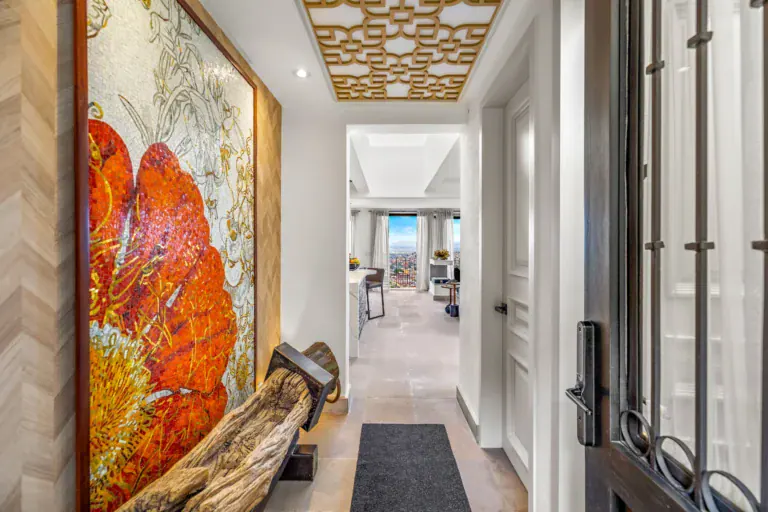 Casa Romana, entry hall with a mosaic poppy mural, San Miguel de Allende