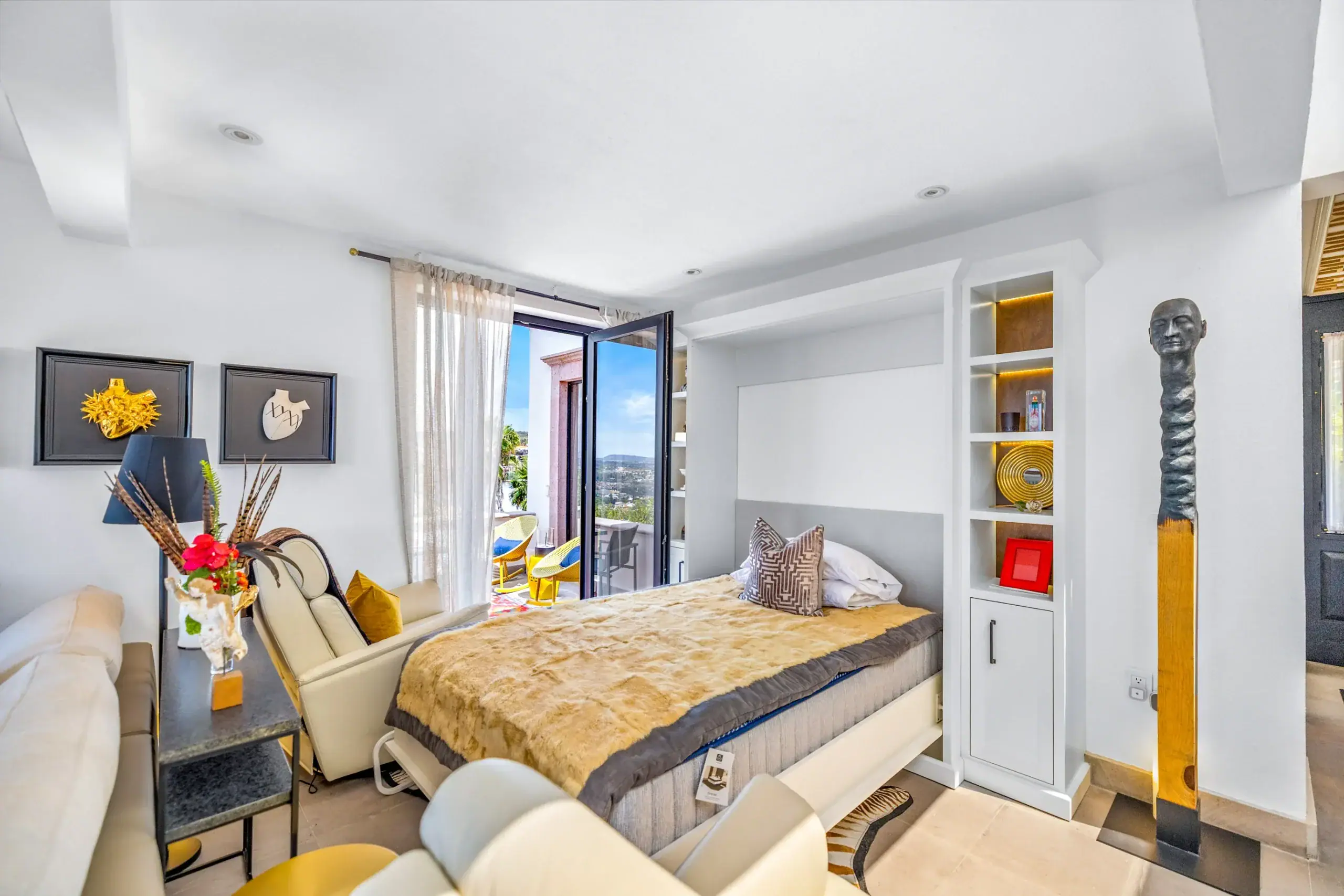 Casa Romana, guest room with a wall bed and a built-in bookcase, San Miguel de Allende