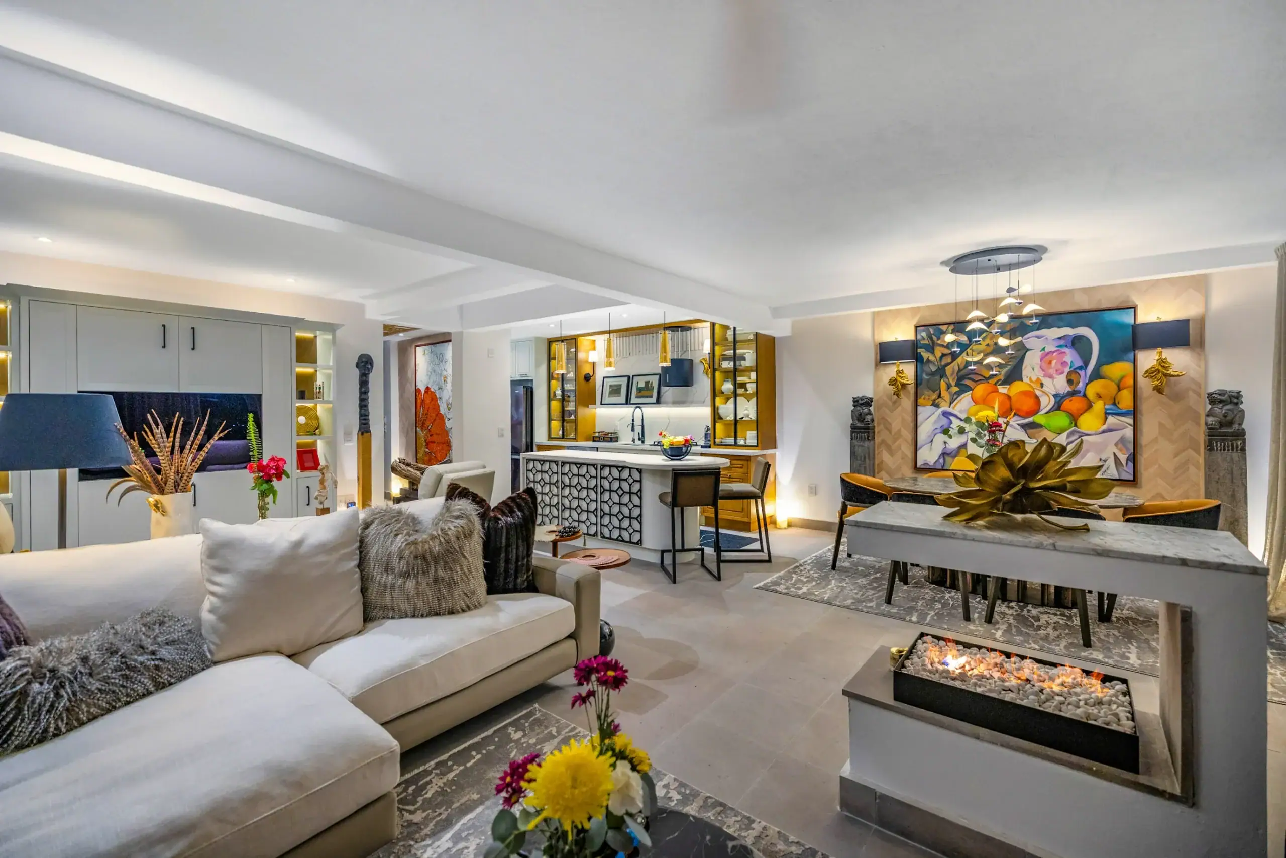 Casa Romana, living room with a modular sofa and a linear fireplace, San Miguel de Allende