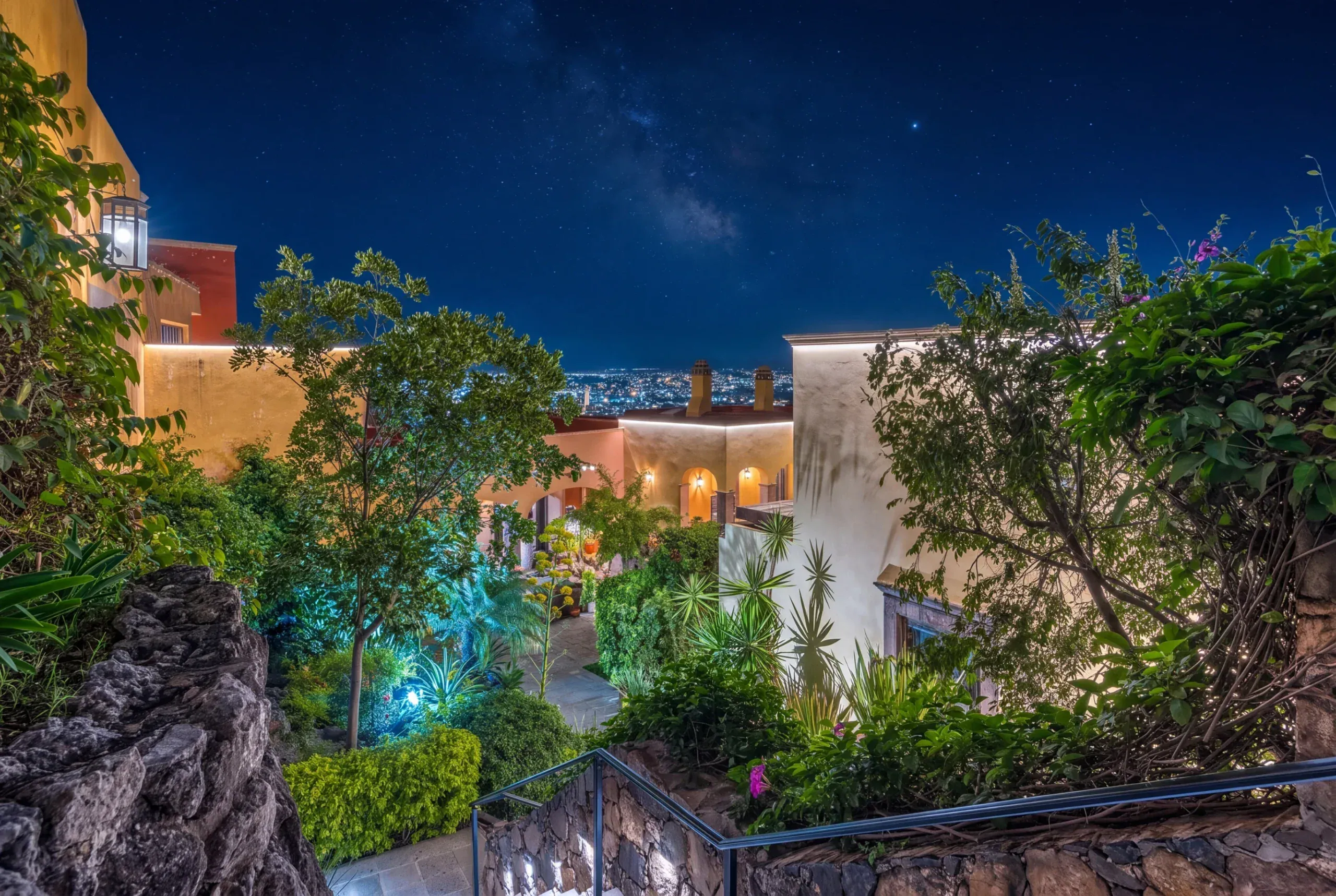 Casa Romana, landscaped gardens of the complex at night under the stars, San Miguel de Allende
