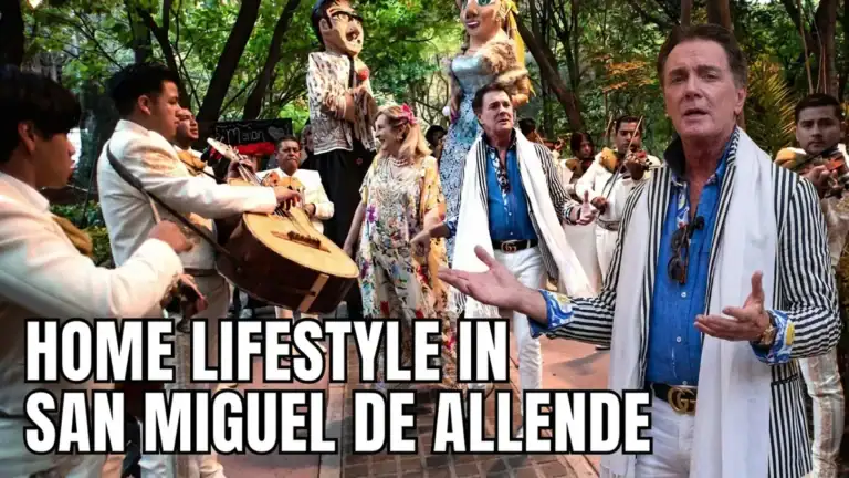 Greg Gunter in a striped shawl among mariachi musicians and giant parade puppets, with the text 'Home Lifestyle in San Miguel de Allende'