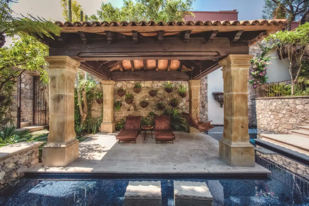 Casa Aldama, pergola with seating beside the pool, San Miguel de Allende