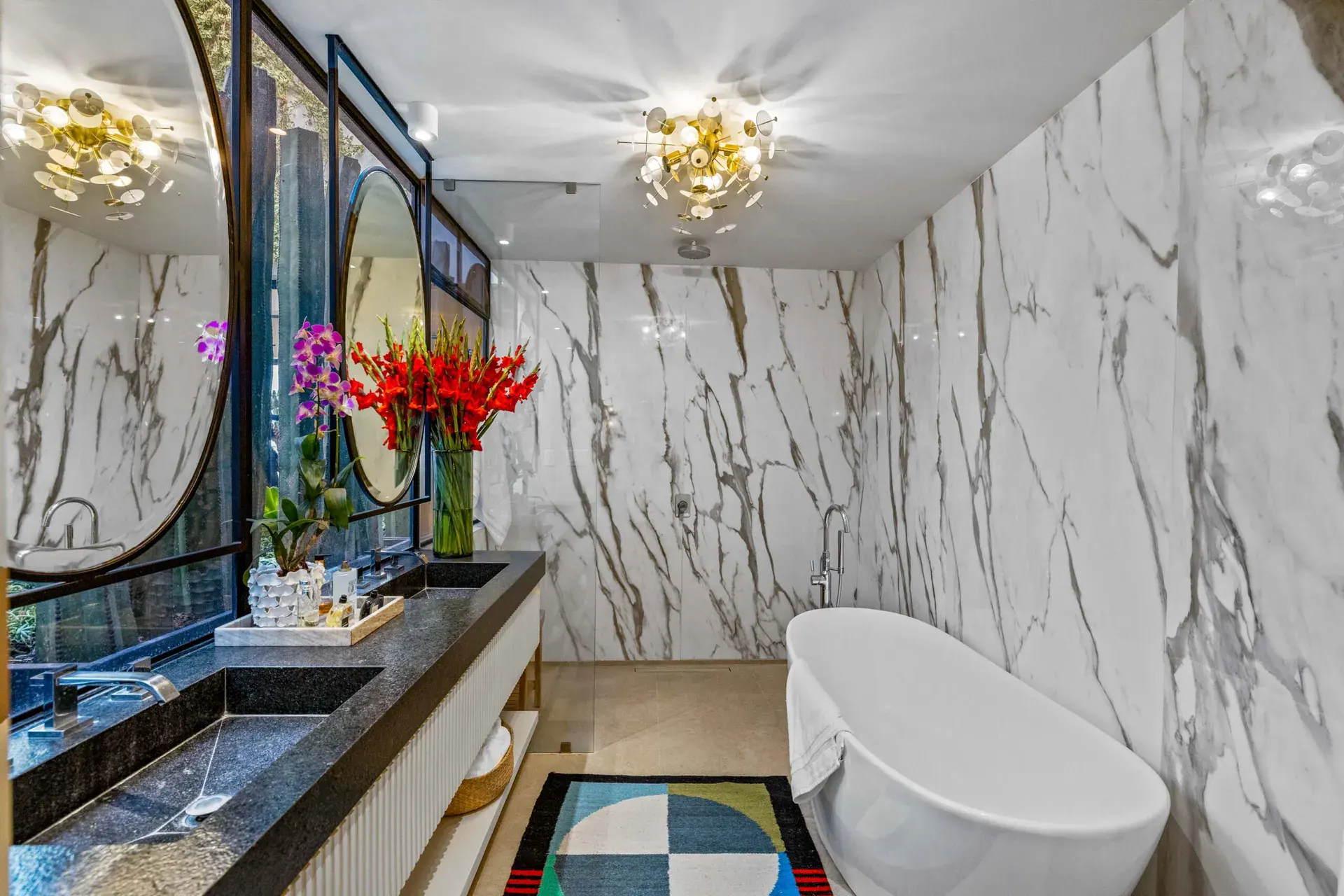Casa Amoray, bathroom with a freestanding tub and a marble wall, San Miguel de Allende