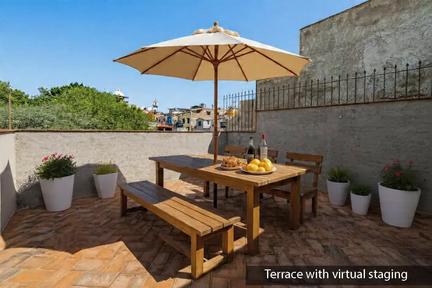 Casa Beatrice, roof terrace with a wood dining table, benches, white planters and a cream umbrella, labeled as virtually staged, San Miguel de Allende