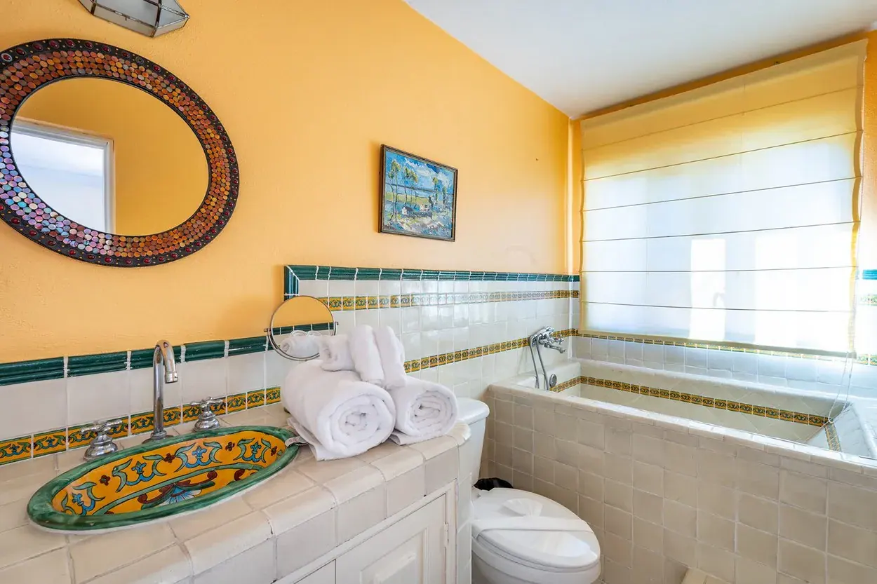 Casa Caminando, bathroom with a talavera sink and a soaking tub, San Miguel de Allende