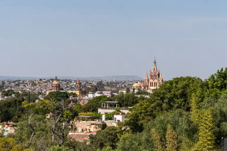 Casa Cañadita, view over the trees to the Parroquia and the city, San Miguel de Allende