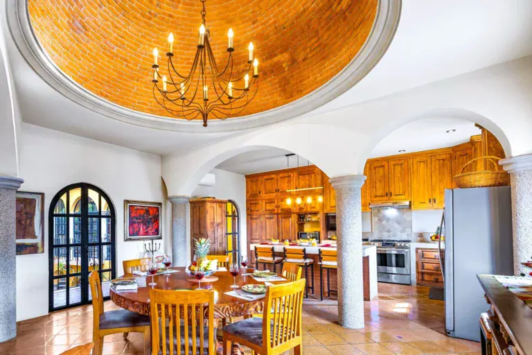 Casa Caracol Rojo, dining room under a painted dome with a chandelier, San Miguel de Allende