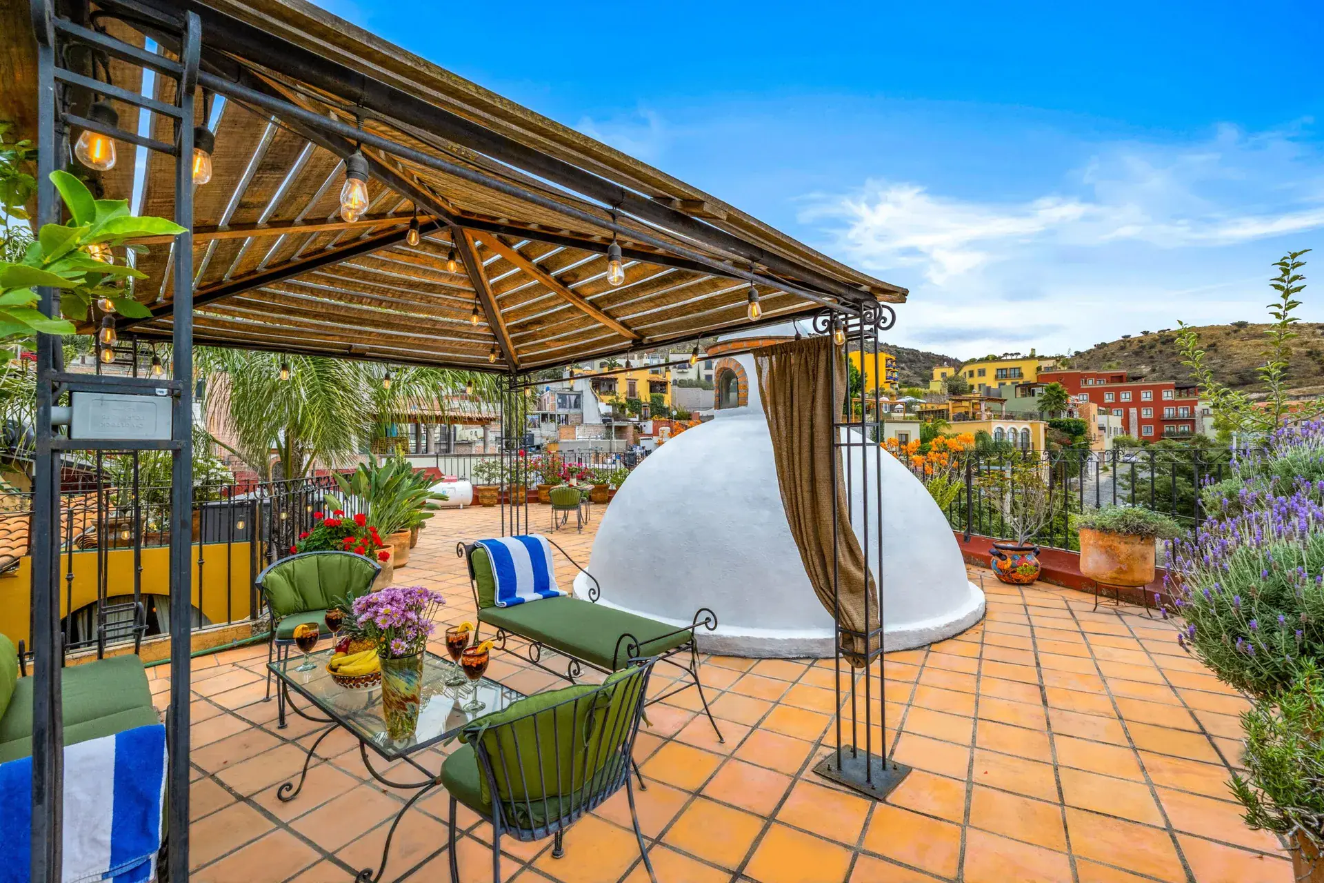 Casa Caracol Rojo, rooftop terrace with a pergola and a white dome, San Miguel de Allende