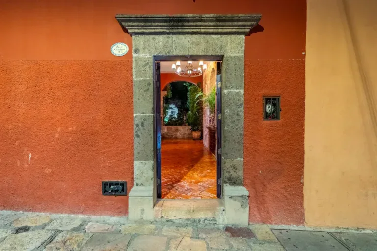 Casa Carolina, stone doorway opening to the entry hall and garden, San Miguel de Allende