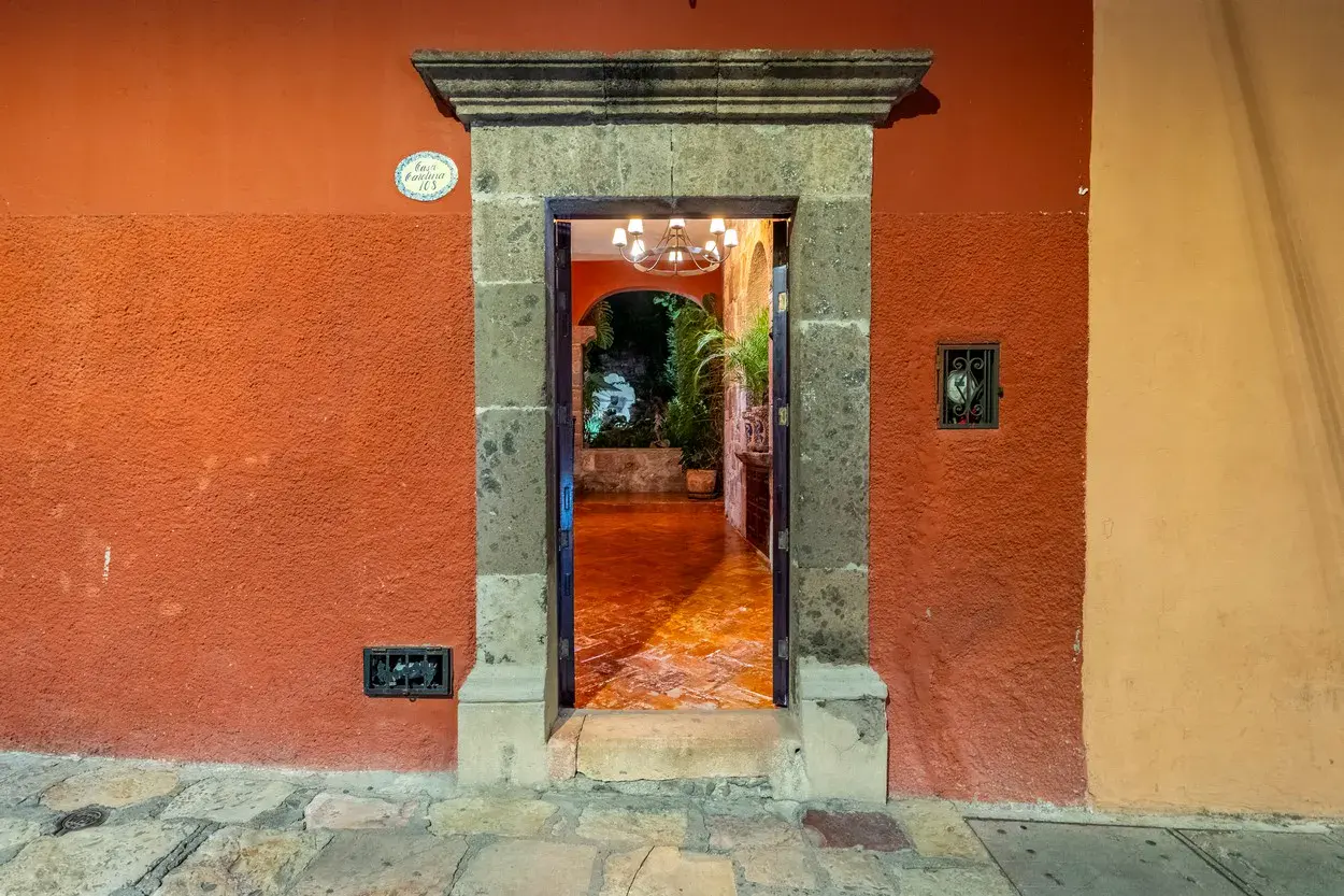 Casa Carolina, stone doorway opening to the entry hall and garden, San Miguel de Allende