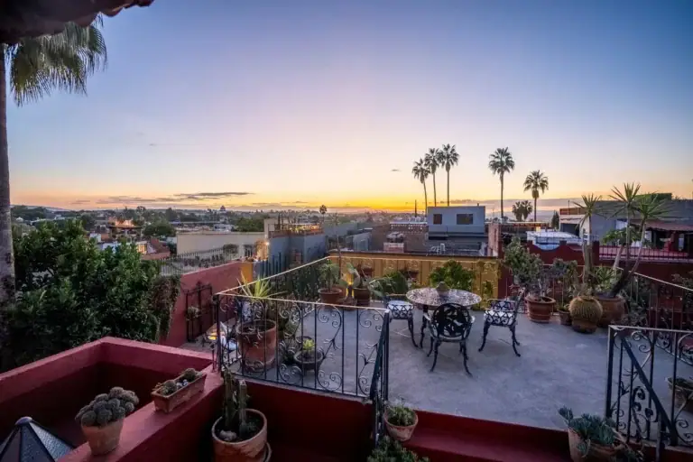 Casa Carolina, rooftop terrace with a dining table at sunset, San Miguel de Allende