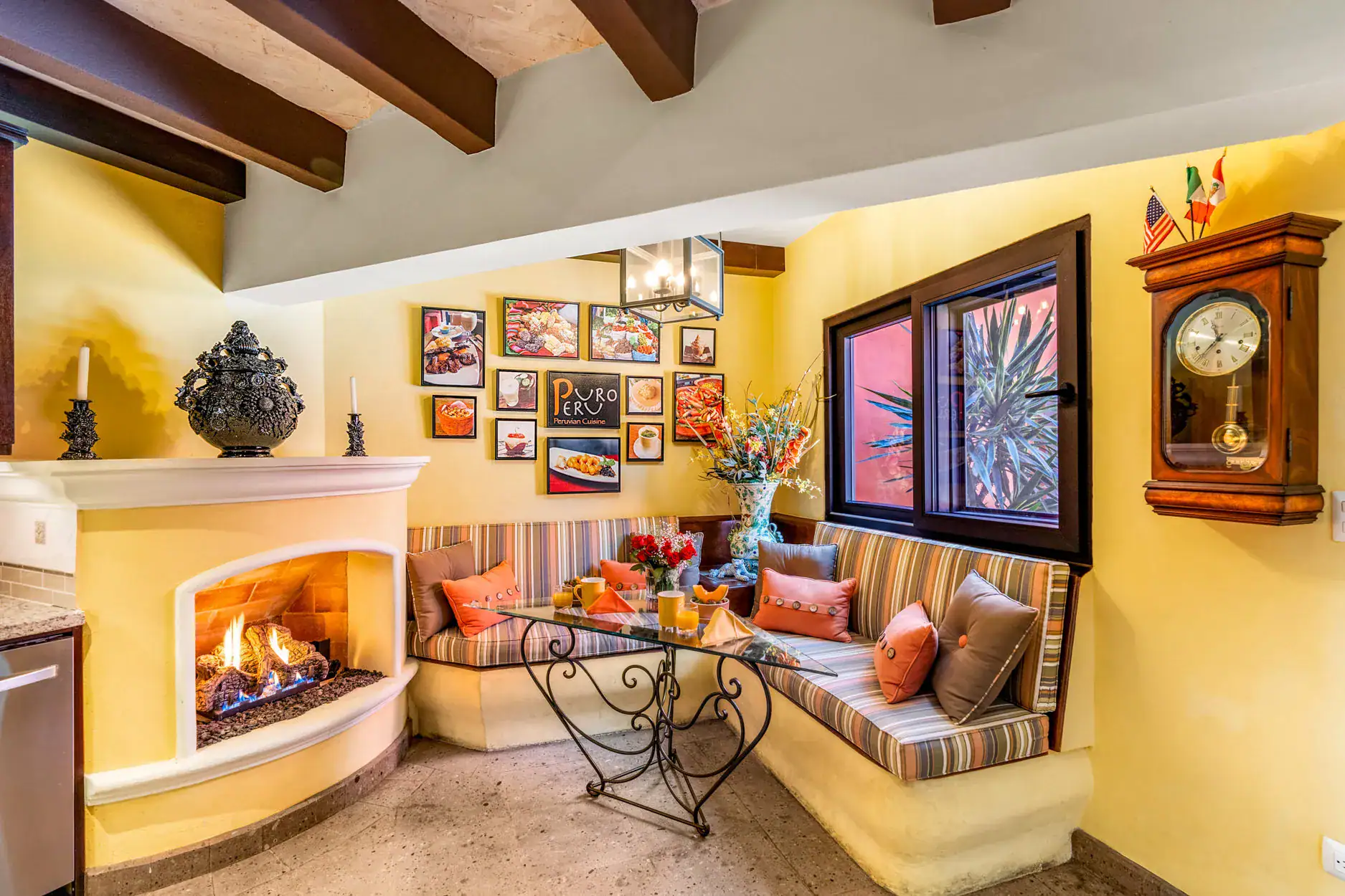 Casa Cleo Petra, breakfast nook with a fireplace and a built-in bench, San Miguel de Allende
