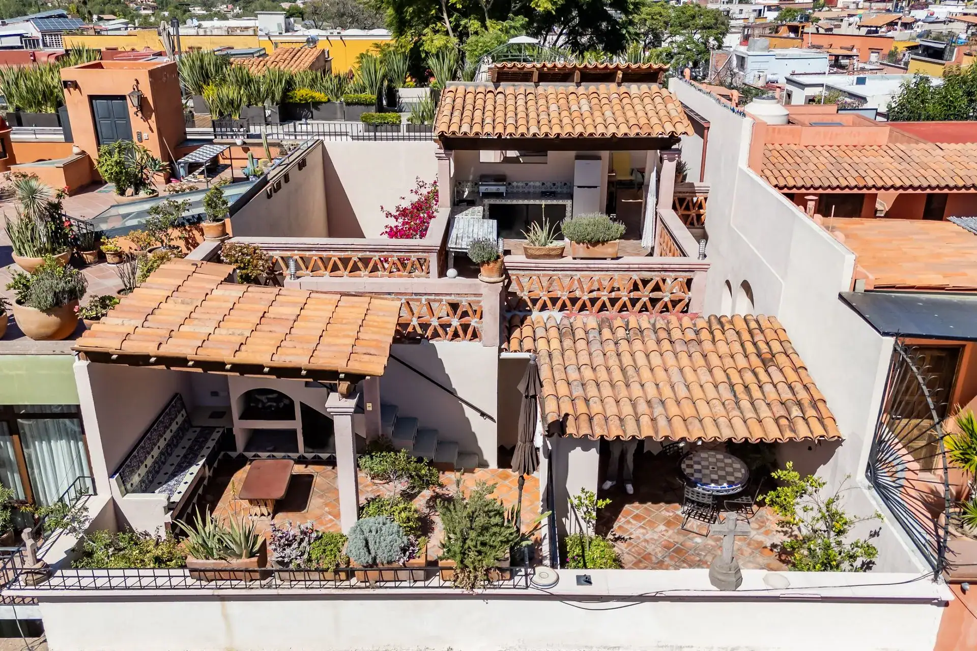 Casa de las Cruces, aerial view of the rooftop terraces with tile-roofed pavilions and gardens, San Miguel de Allende
