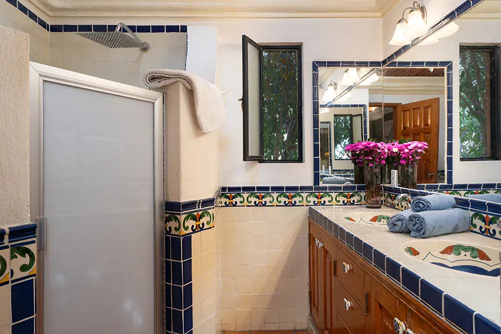 Casa DeeDee, bathroom with a talavera sink and blue and white tile, San Miguel de Allende