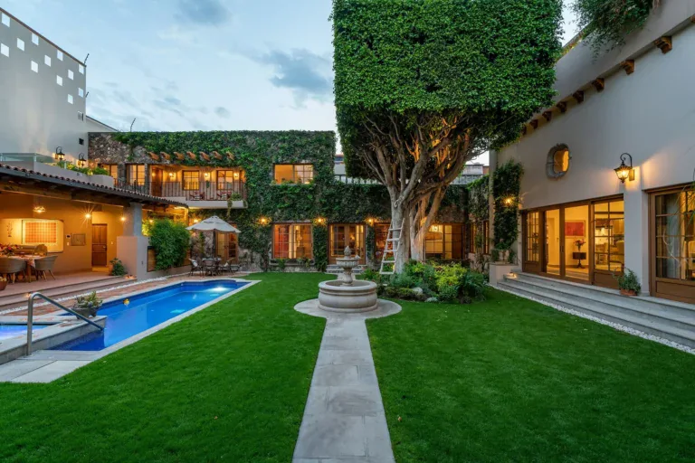Casa del Angel, courtyard garden and pool at dusk, San Miguel de Allende