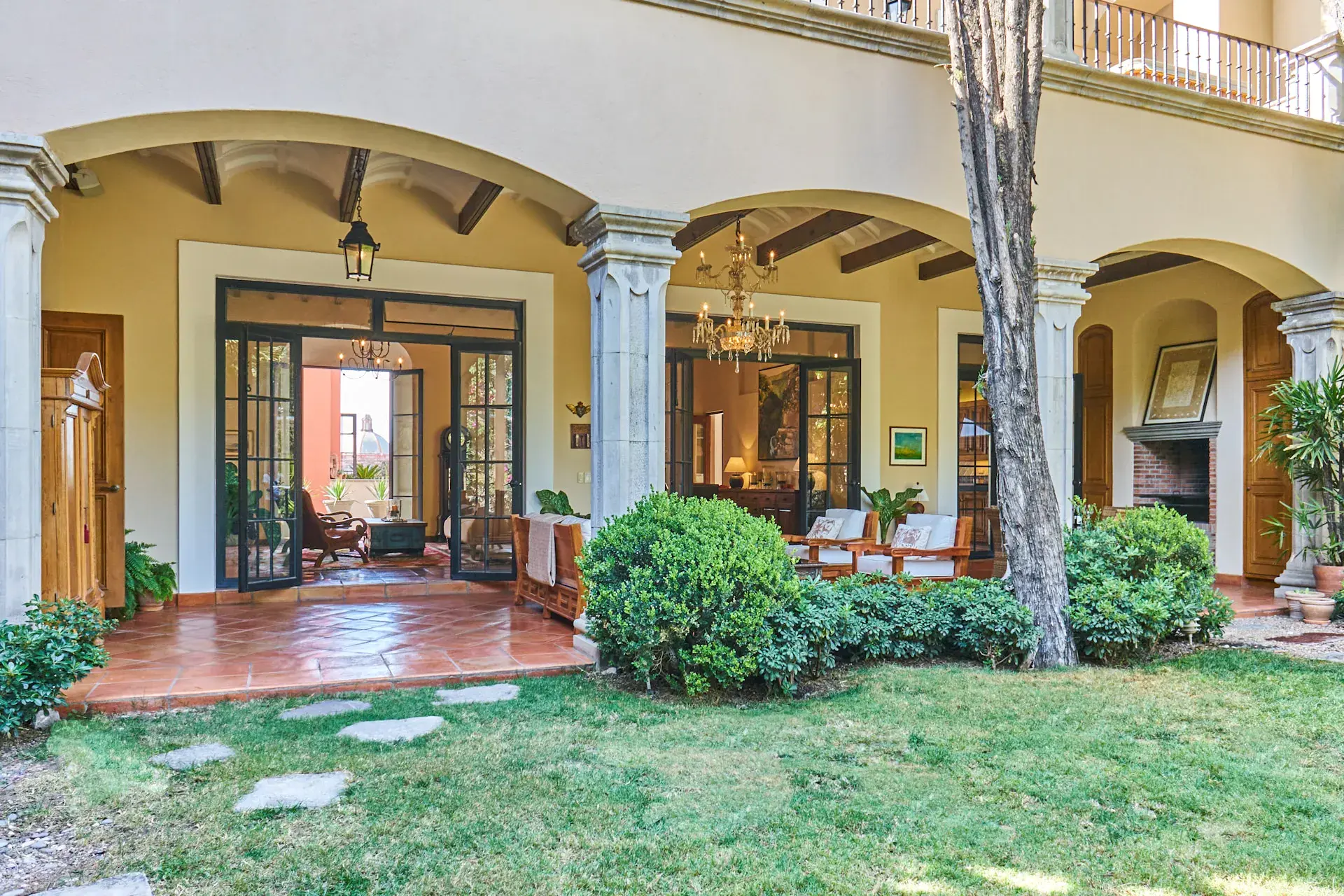 Casa Familia, arcaded loggia opening to a lawn and garden, San Miguel de Allende