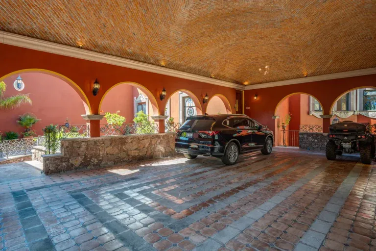 Casa La Colina, arcaded garage and courtyard with a mosaic floor, San Miguel de Allende