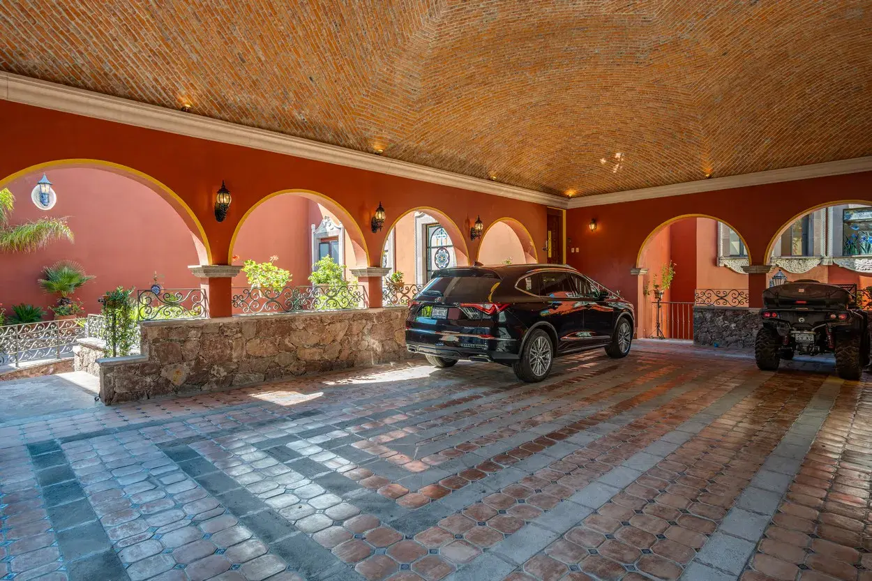 Casa La Colina, arcaded garage and courtyard with a mosaic floor, San Miguel de Allende