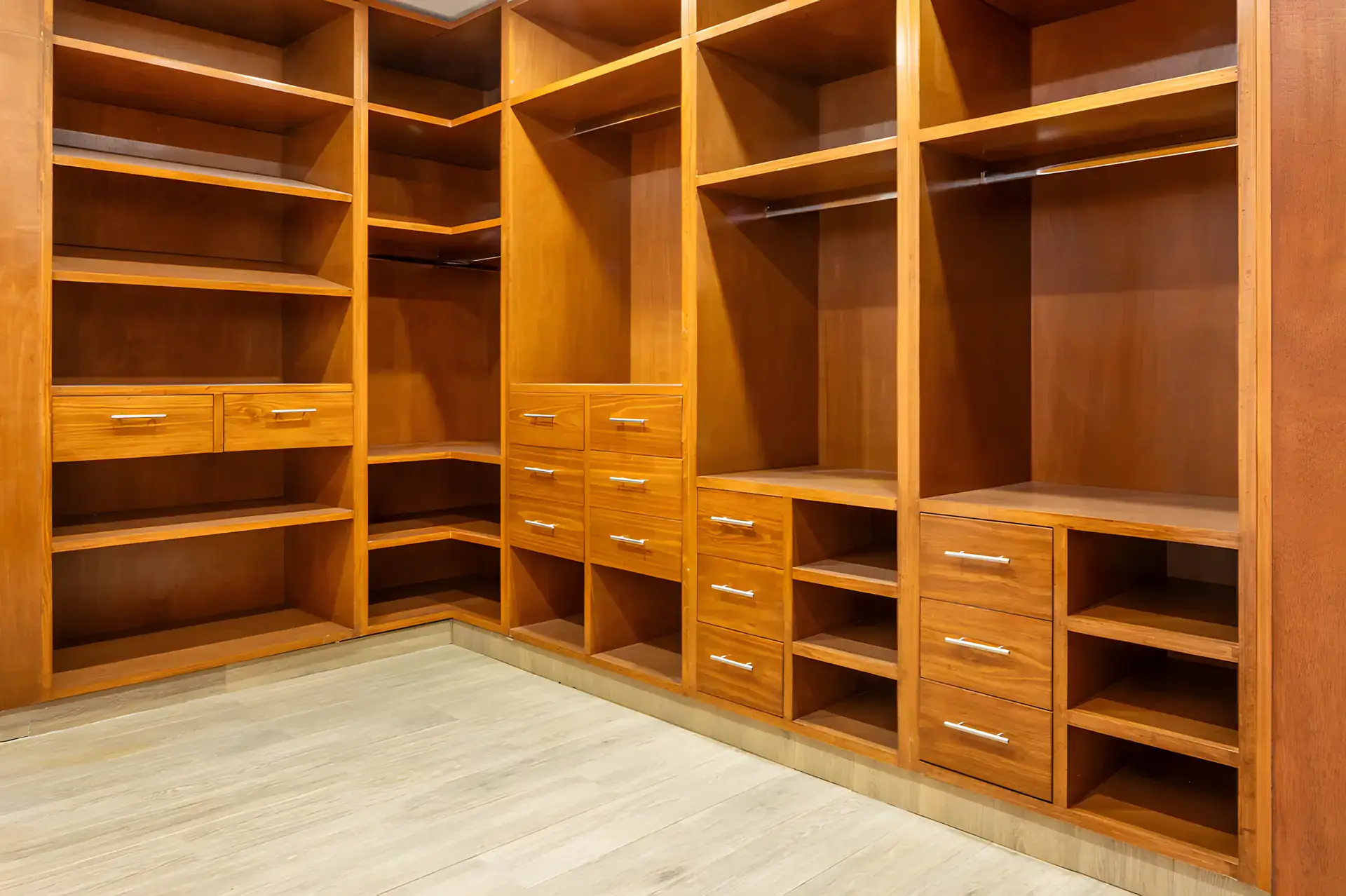 Casa Milagros, walk-in closet with wood shelving, drawers and hanging rods, San Miguel de Allende