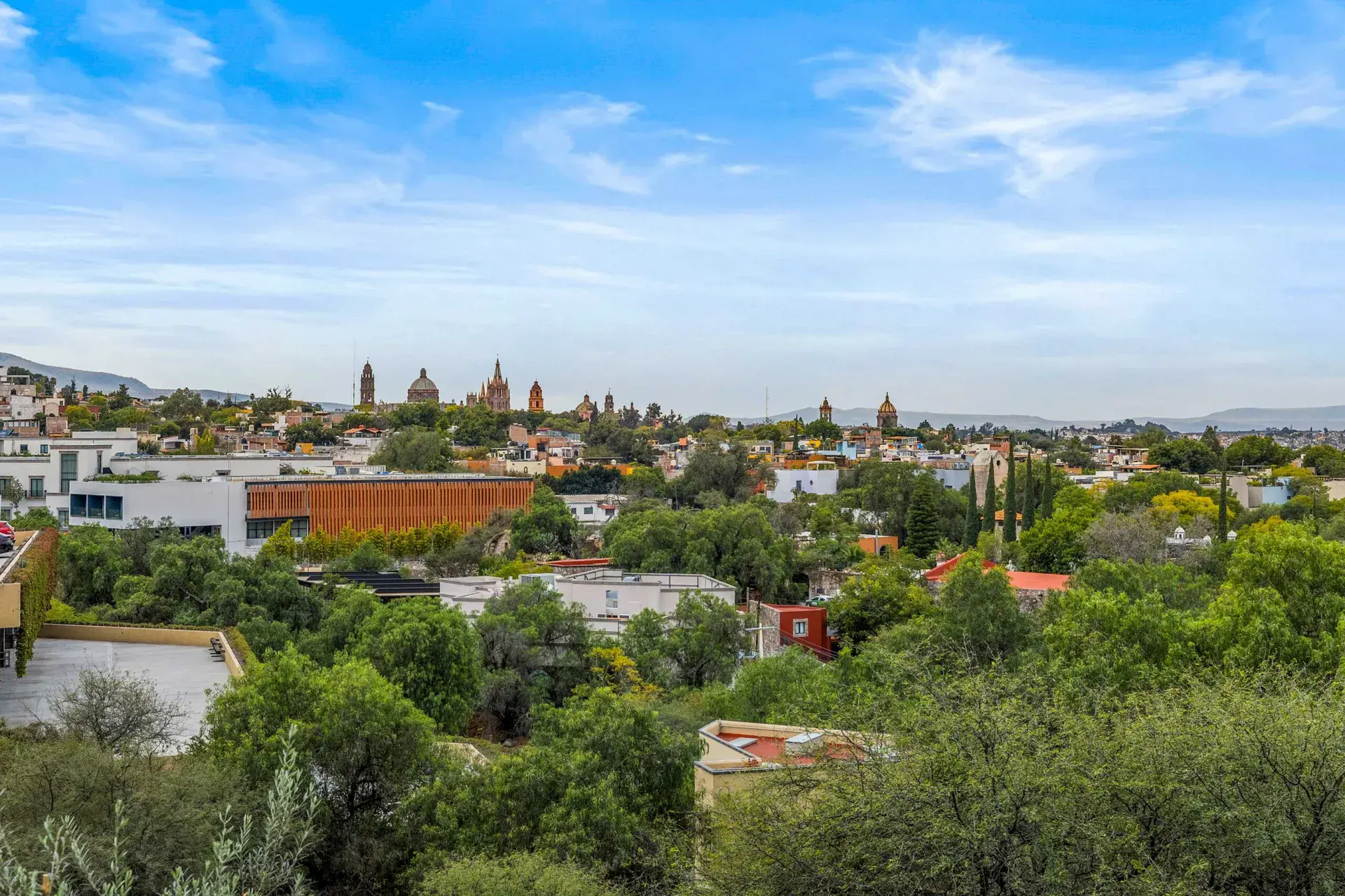 Casa Noche Magica, view over the town with the Parroquia and church domes from the terrace, San Miguel de Allende