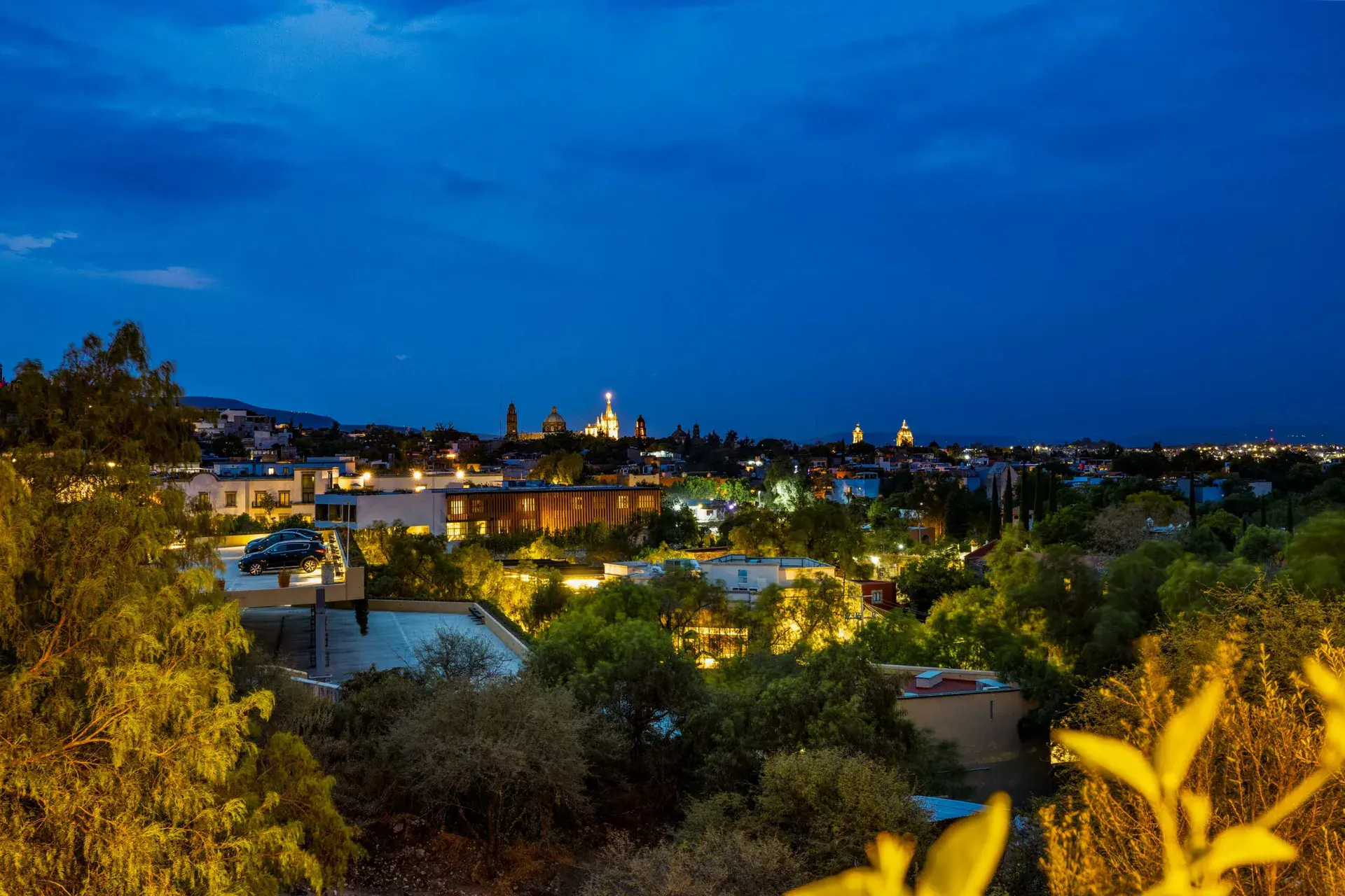 Casa Noche Magica, night view of the lit town with church domes from the property, San Miguel de Allende