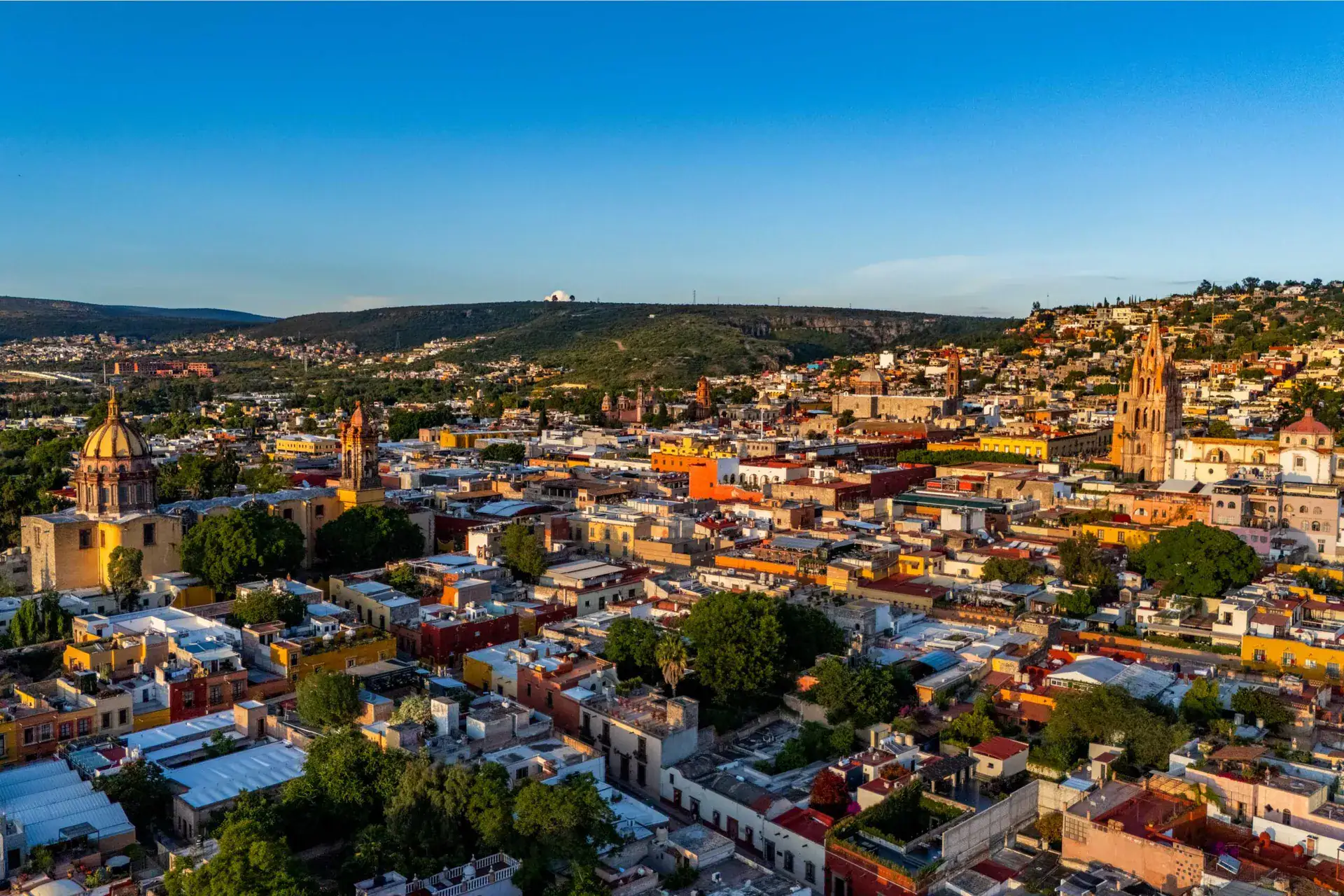 Casa Nostra Familia, view over the rooftops of San Miguel at sunset, San Miguel de Allende