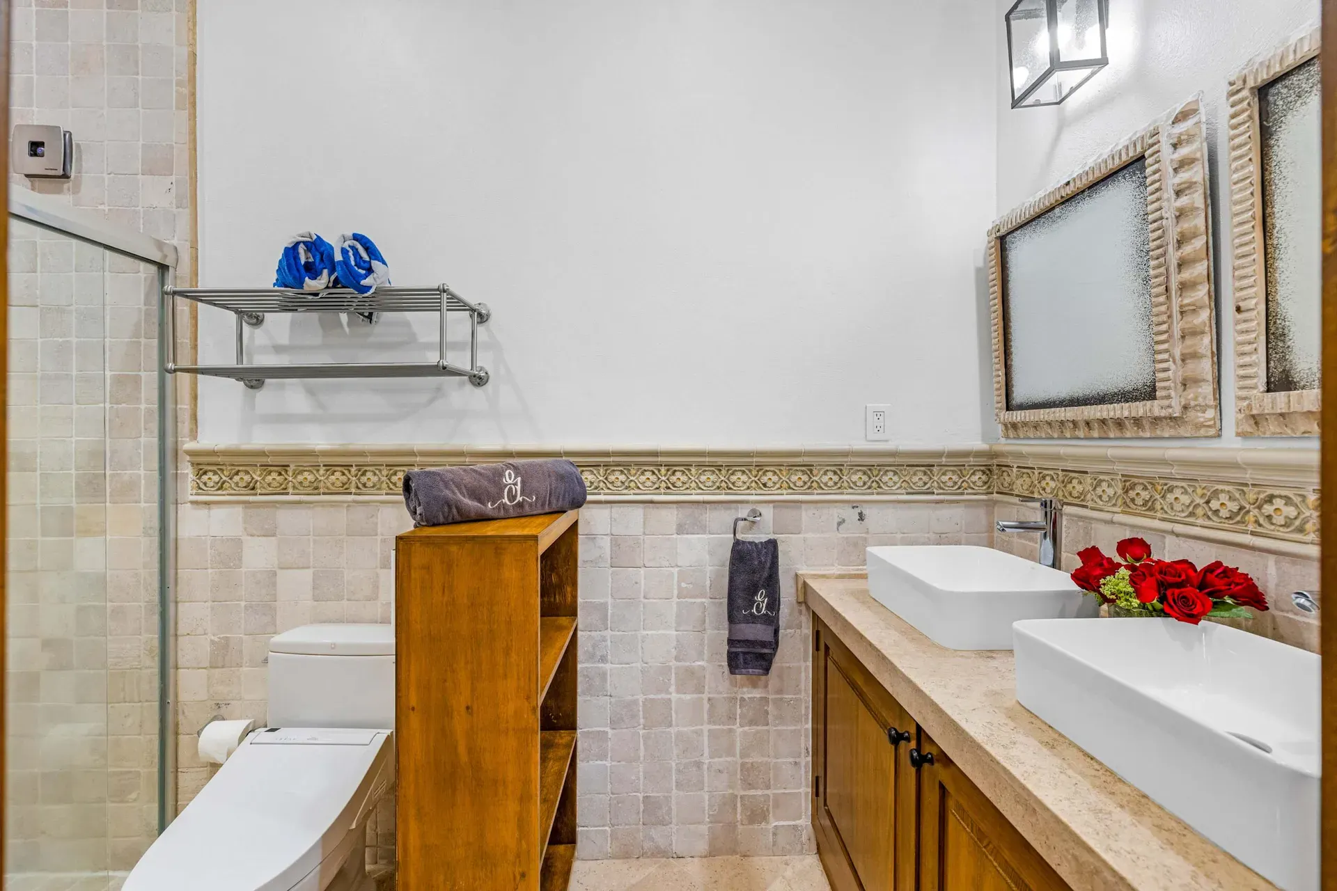 Casa Paradise, bathroom with two vessel sinks and a wood vanity, San Miguel de Allende