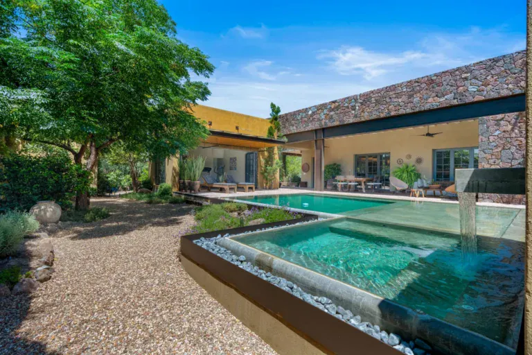 Casa Paz, courtyard pool with a glass water feature and a gravel garden, San Miguel de Allende