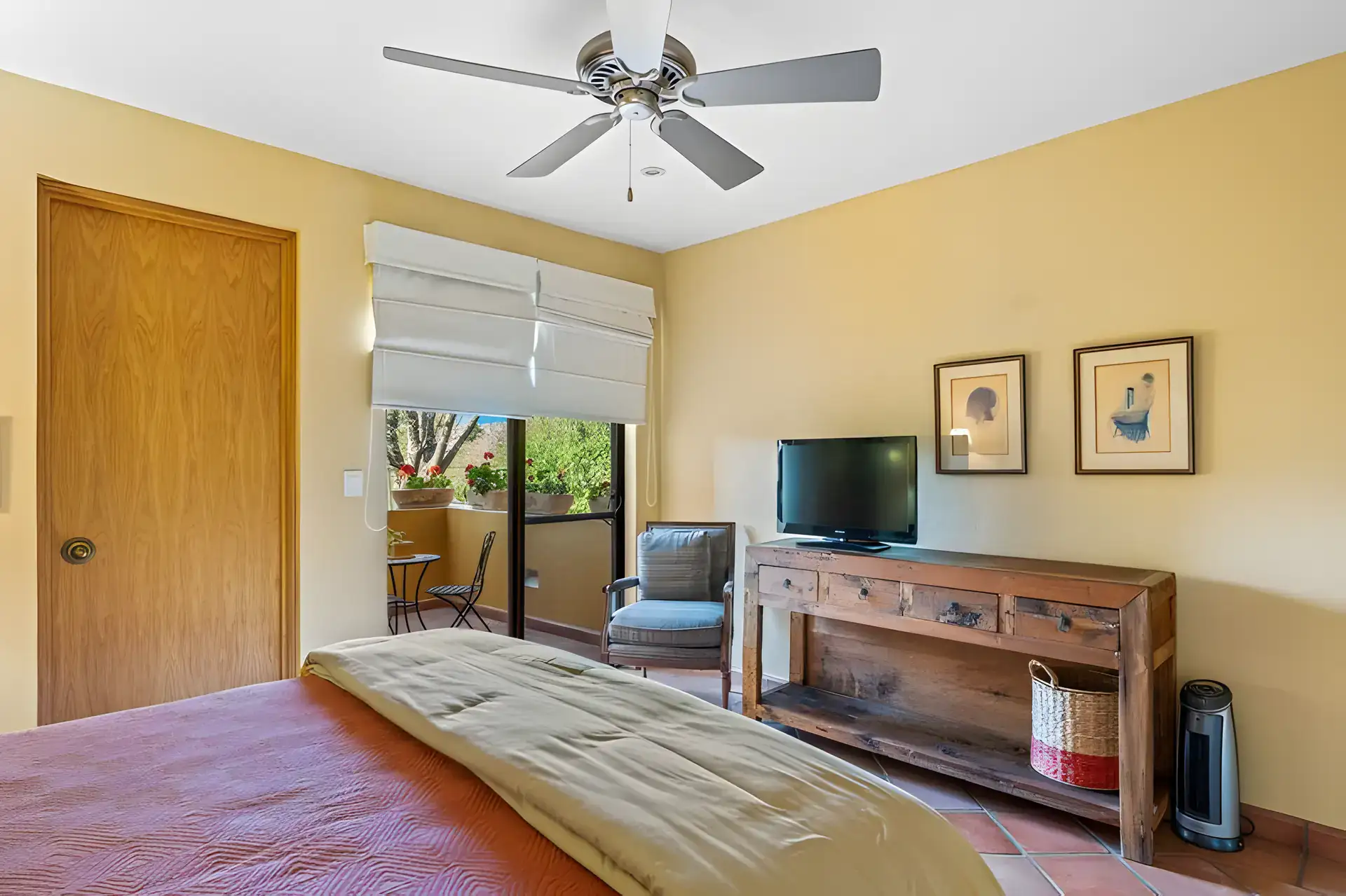 Casa Privada, bedroom with a ceiling fan, a television on a wood console and a view to a balcony, San Miguel de Allende