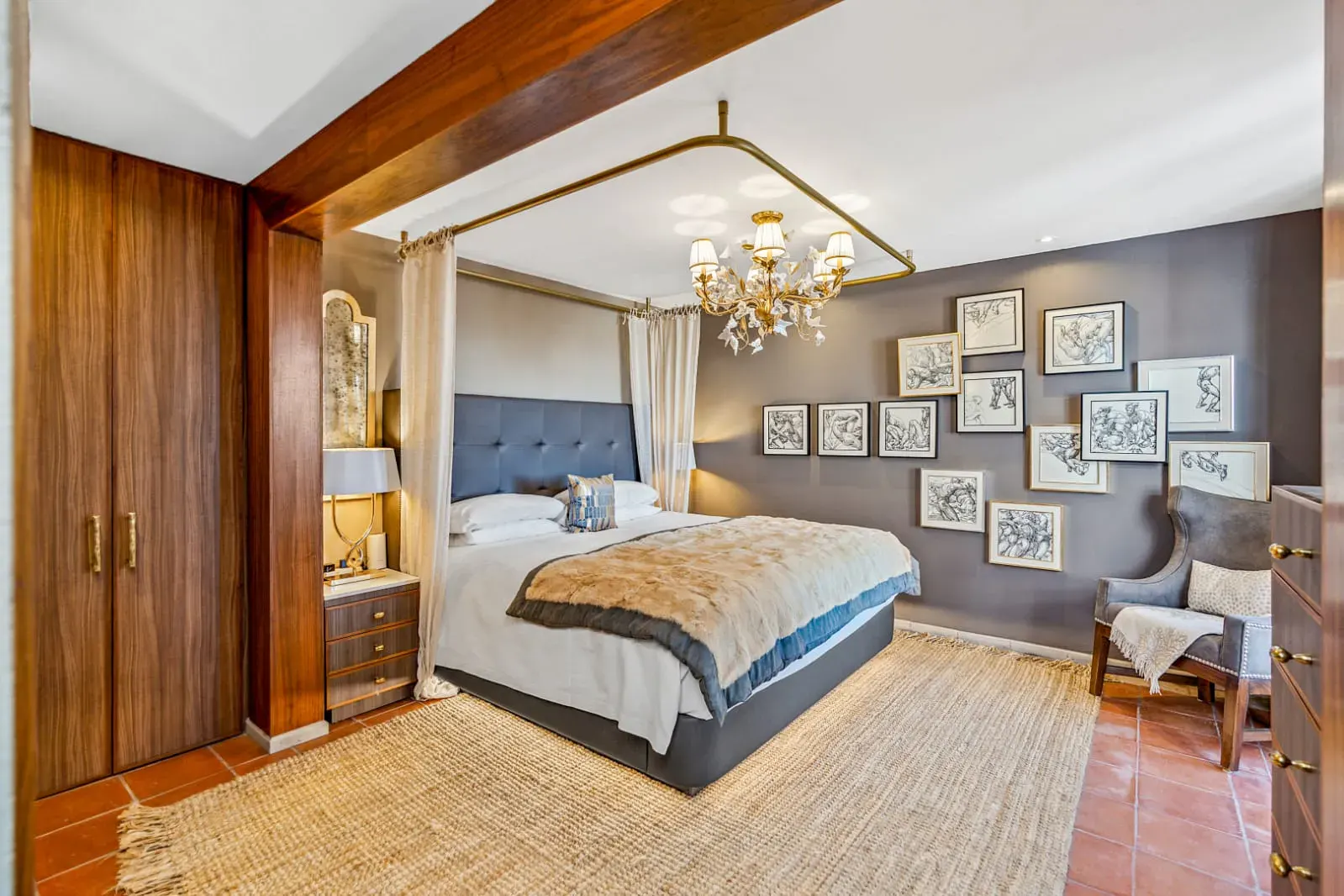 Casa San Rafael, primary bedroom with a quilted headboard and a canopy frame, San Miguel de Allende