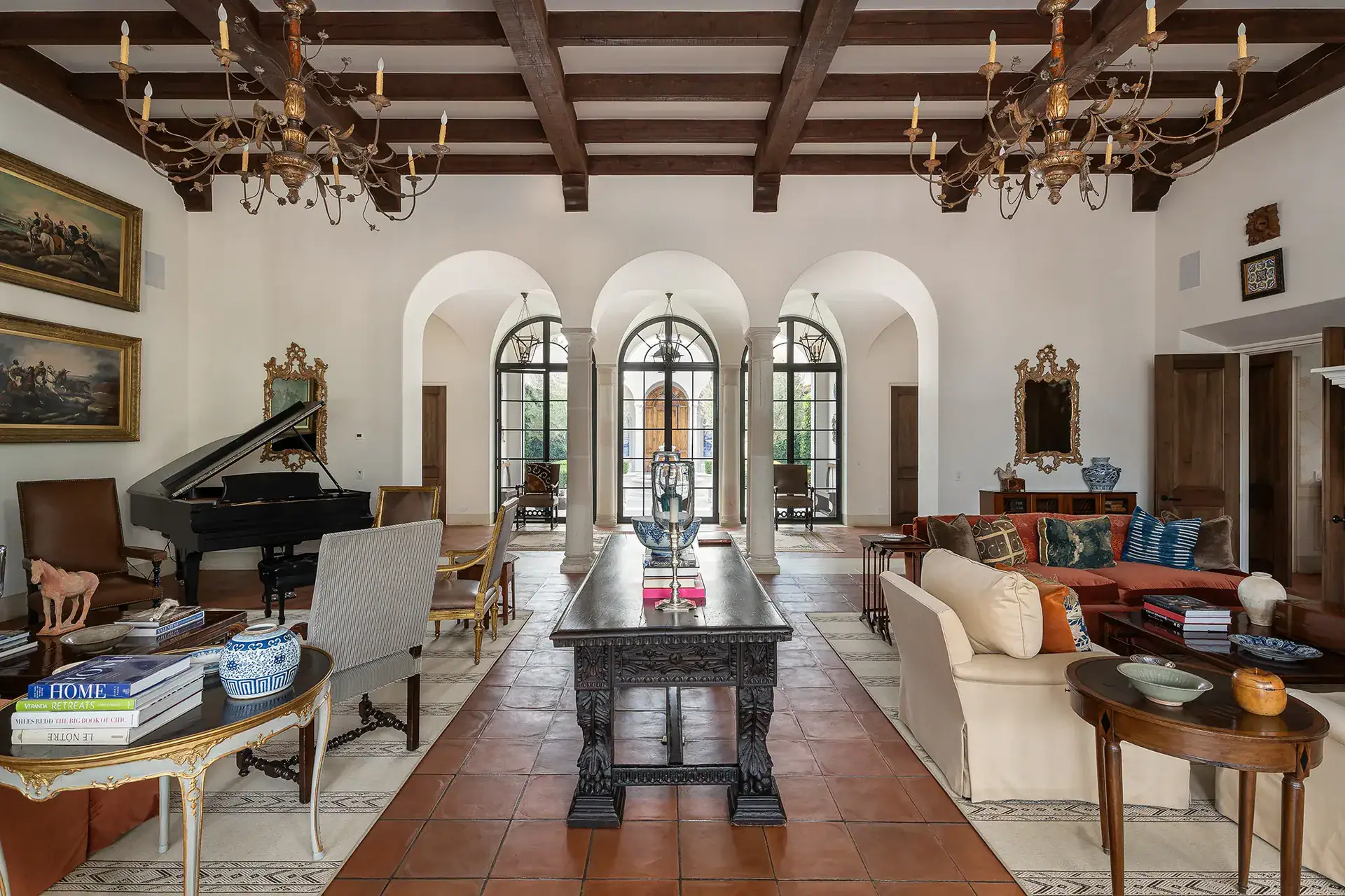 Casa Sienna, great room with beamed ceilings, arched windows, a grand piano and seating areas, San Miguel de Allende