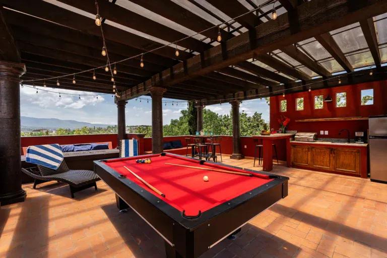 Casa Texican, rooftop terrace with a pool table and lounge chairs, San Miguel de Allende