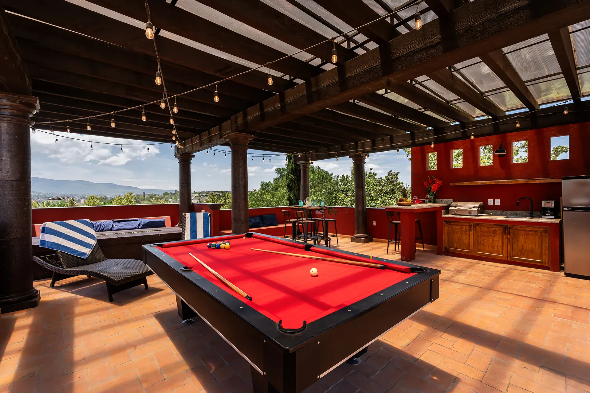 Casa Texican, rooftop terrace with a pool table and lounge chairs, San Miguel de Allende