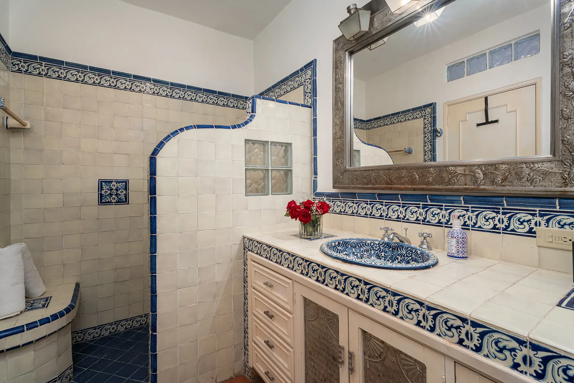 Casa Victoria, bathroom with a talavera sink and blue and white tile, San Miguel de Allende