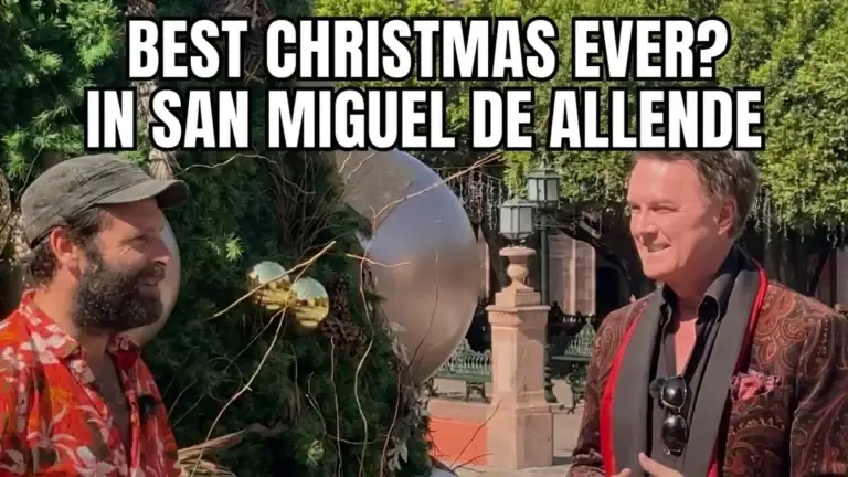 Greg Gunter in a brown paisley jacket talking with a bearded man in a red floral shirt and cap beside a decorated Christmas tree in San Miguel de Allende, with the text 'Best Christmas Ever?'
