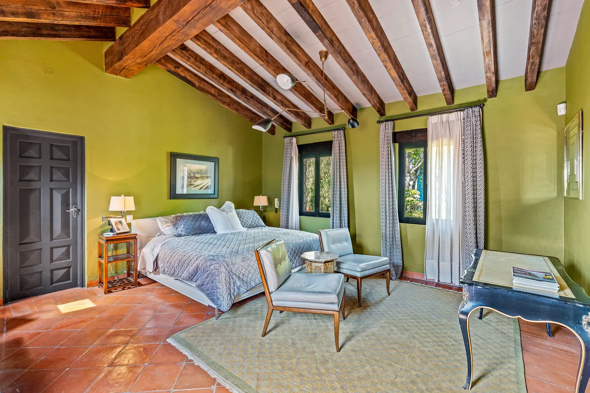 Cuesta de San Jose 22, bedroom with olive green walls, a bed, a lounge chair, a desk and a timber ceiling, San Miguel de Allende