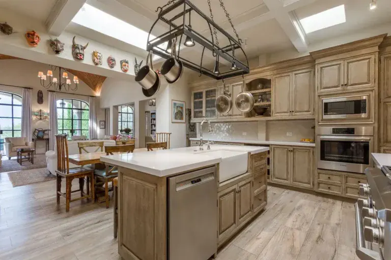 Finca Garambullos, kitchen with a farmhouse sink, a pot rack and a center island, San Miguel de Allende