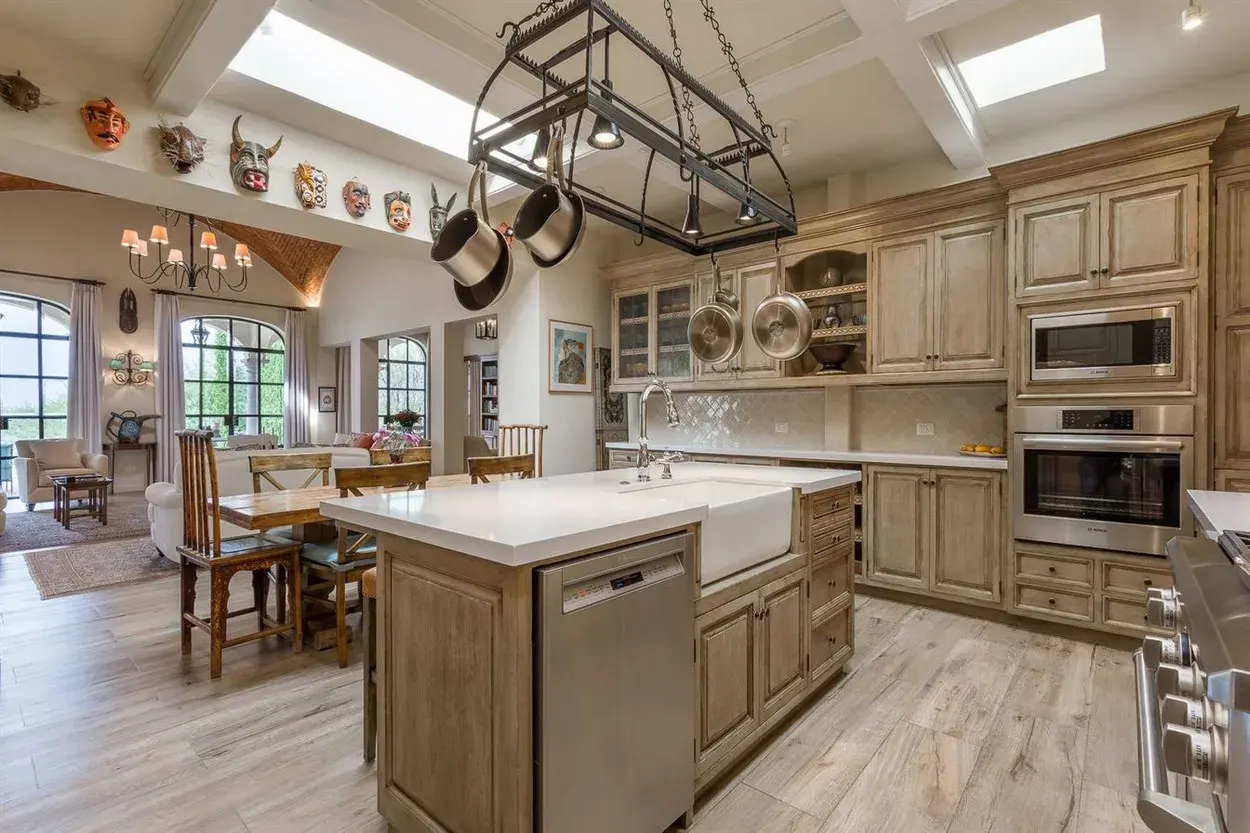 Finca Garambullos, kitchen with a farmhouse sink, a pot rack and a center island, San Miguel de Allende