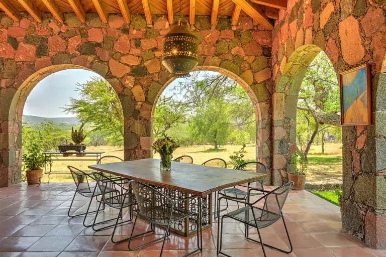 Hacienda Candelaria, stone arcade dining table with open views of the countryside, San Miguel de Allende