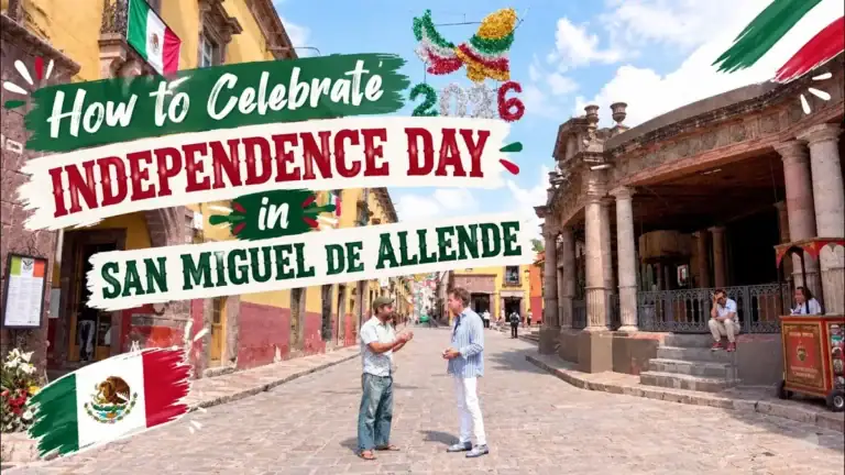 Two men talking on a cobblestone street under Mexican flags, with the text 'How to Celebrate Independence Day in San Miguel de Allende 2026'
